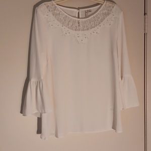 Elle blouse, size M.  Beige in color and made of 100% polyester.
